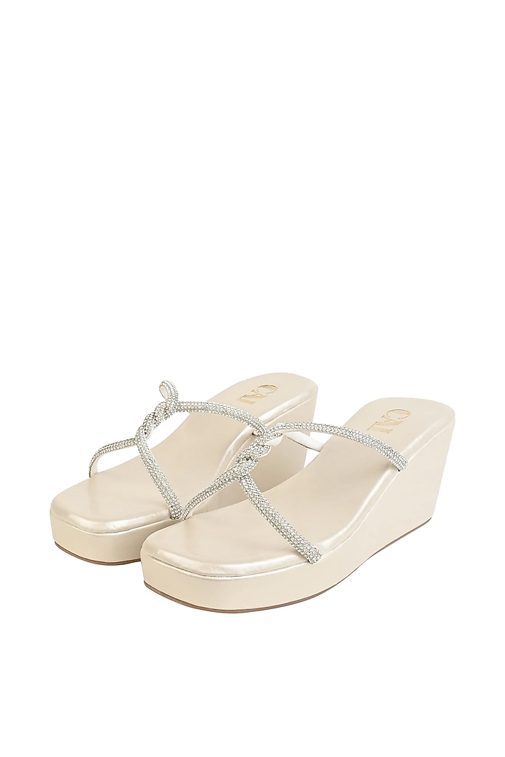 Silver Faux Leather Wedges by CAI at Pernia's Pop Up Shop
