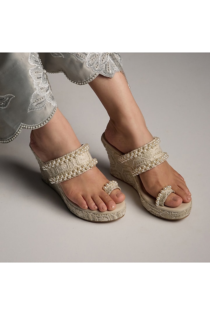 Cream PU & Vegan Leather Pearl Embroidered Wedges by CAI at Pernia's Pop Up Shop