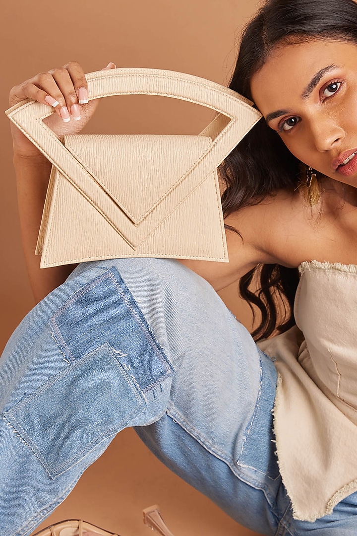 Cream PU & Vegan Leather Handbag by CAI at Pernia's Pop Up Shop