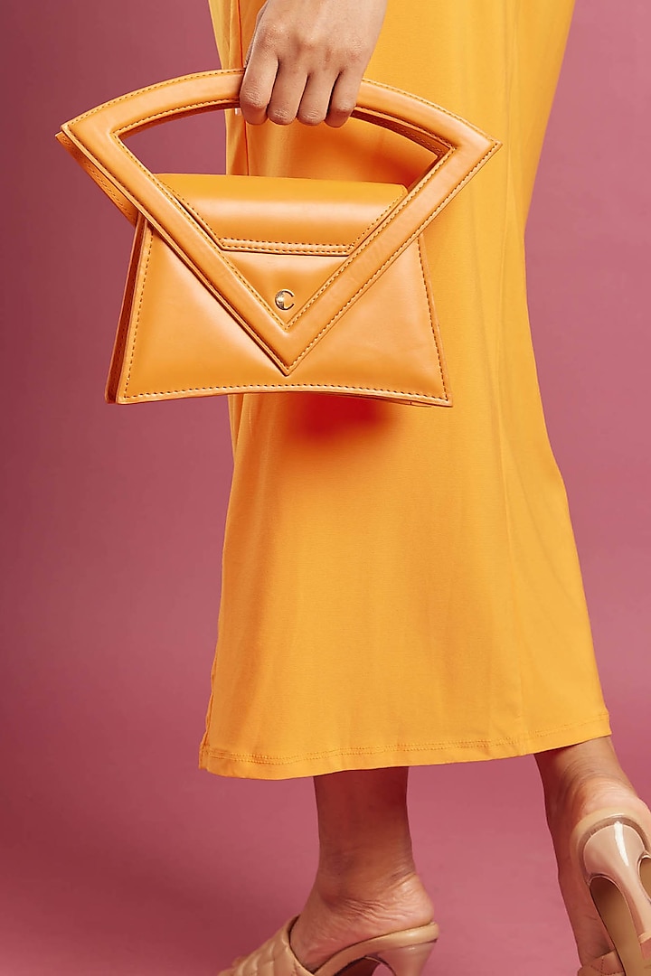 Orange PU & Vegan Leather Handbag by CAI at Pernia's Pop Up Shop