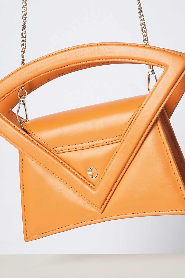 Orange PU & Vegan Leather Handbag by CAI at Pernia's Pop Up Shop