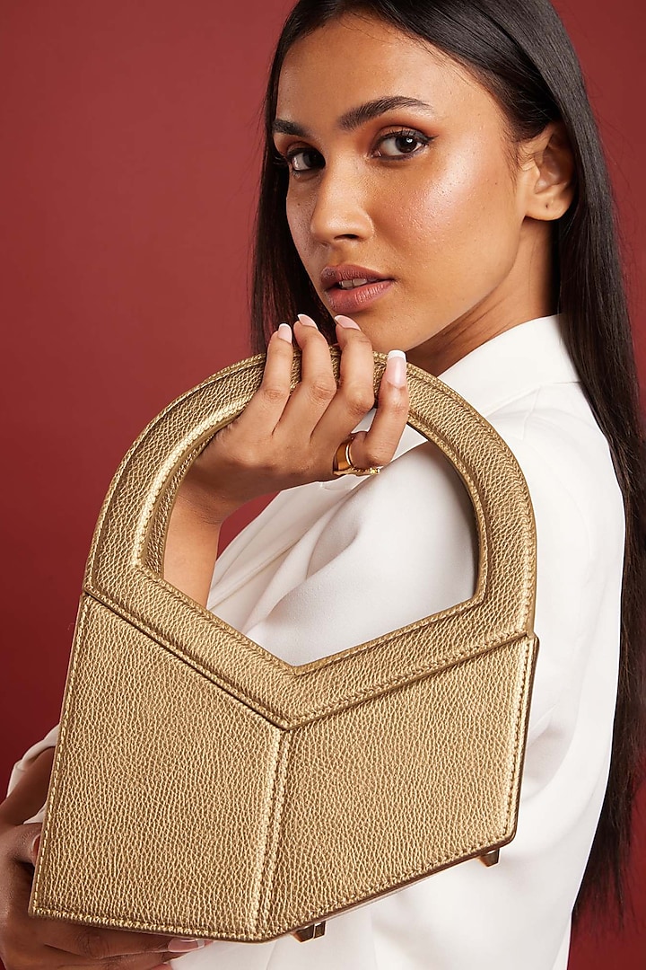 Golden PU & Vegan Leather Handbag by CAI at Pernia's Pop Up Shop