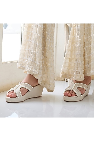 Cream PU Leather Pearl Embellished Wedges by CAI