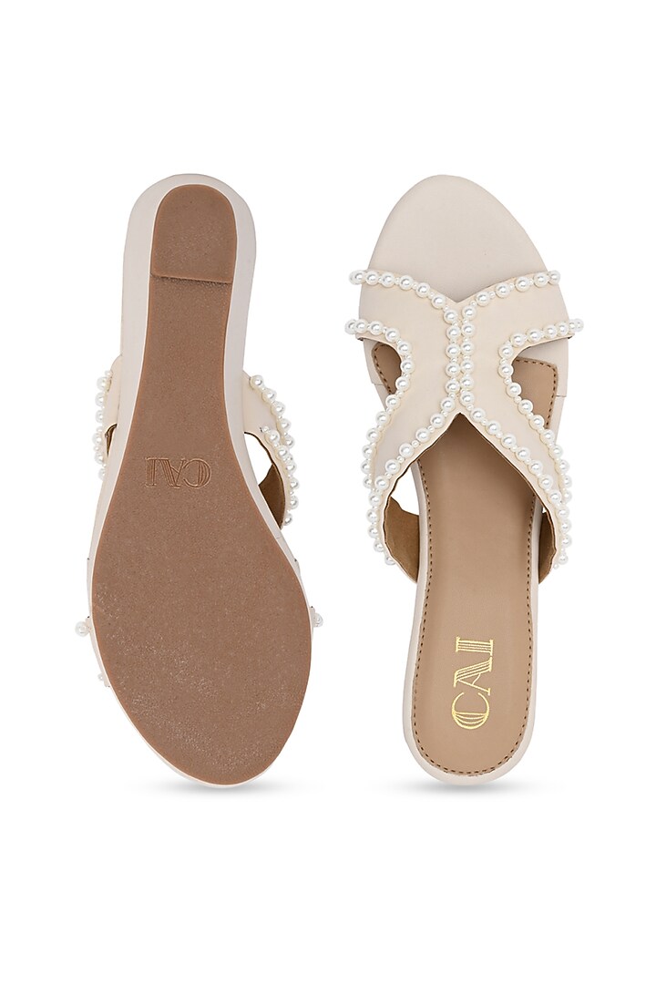 Cream PU Leather Pearl Embellished Wedges by CAI at Pernia's Pop Up Shop