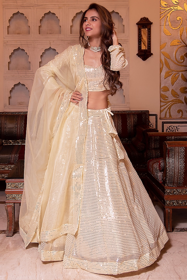 Beige Georgette Sequins Embellished Lehenga Set by Calmna at Pernia's Pop Up Shop