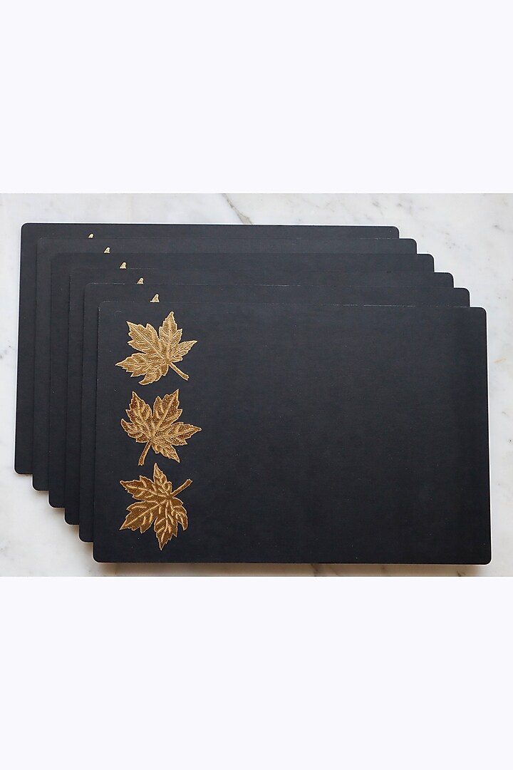 Black Faux Leather & Wooden Floral Printed Table Mats (Set of 6) by Chrysante By Gunjan Gupta