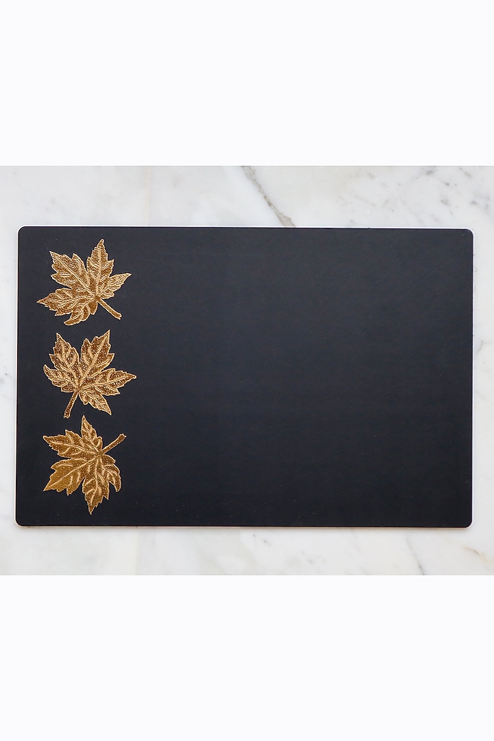 Black Faux Leather & Wooden Floral Printed Table Mats (Set of 6) by Chrysante By Gunjan Gupta at Pernia's Pop Up Shop