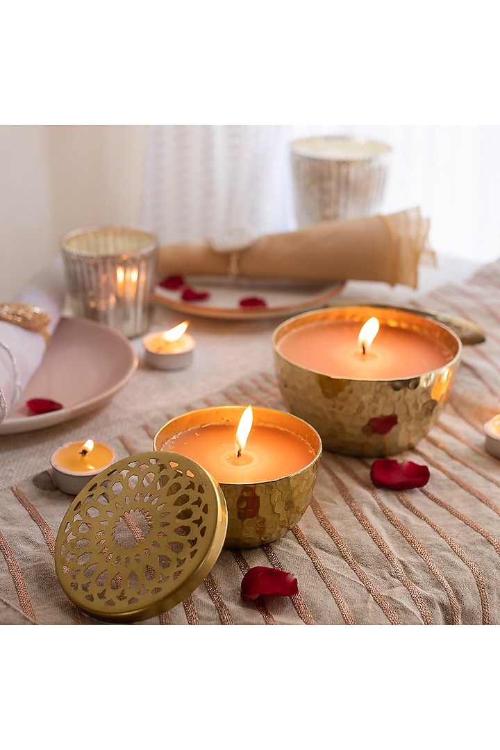Gold Metal Candles With Jasmine Scented Wax (Set of 2) by Chrysante By Gunjan Gupta at Pernia's Pop Up Shop