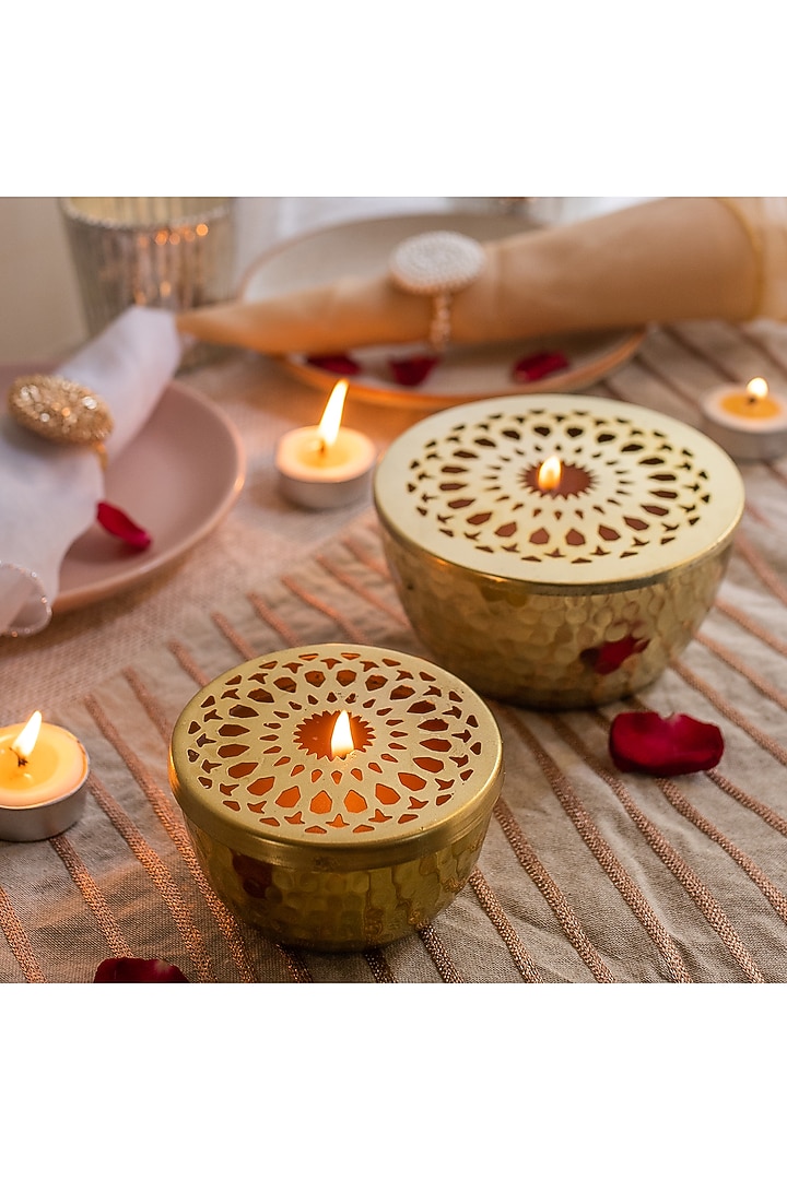 Gold Metal Candles With Jasmine Scented Wax (Set of 2) by Chrysante By Gunjan Gupta at Pernia's Pop Up Shop