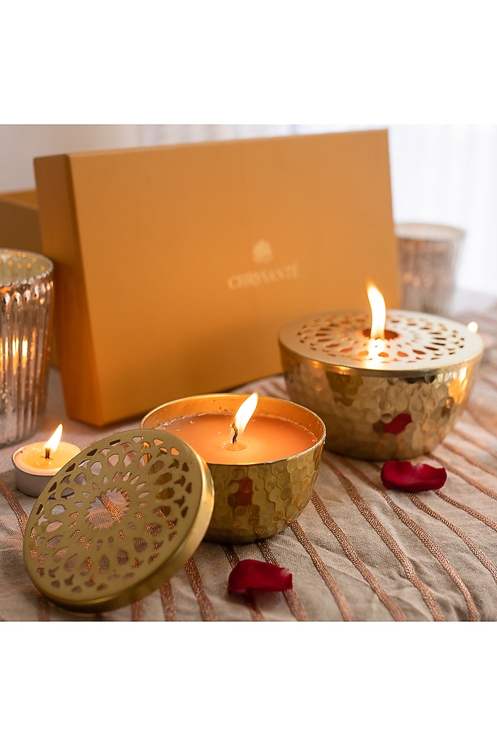 Gold Metal Candles With Jasmine Scented Wax (Set of 2) by Chrysante By Gunjan Gupta at Pernia's Pop Up Shop