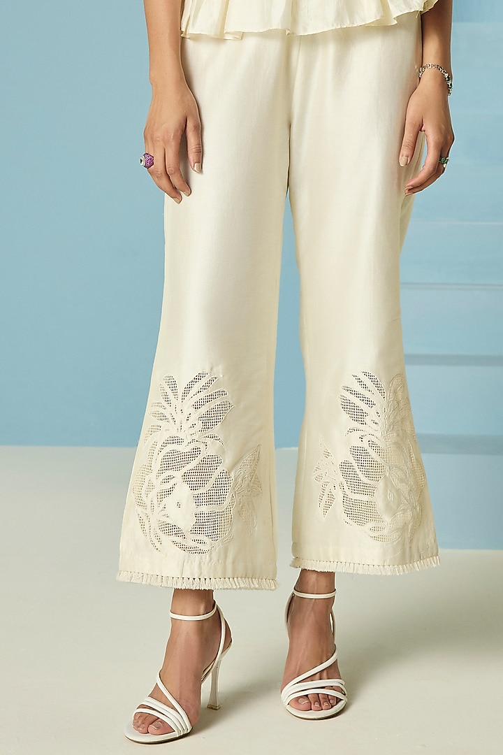 Ivory Chanderi Floral Applique Straight Pants by Chandrima at Pernia's Pop Up Shop