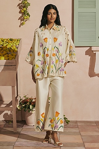 Ivory Chanderi Floral Thread Work Straight Pants by Chandrima