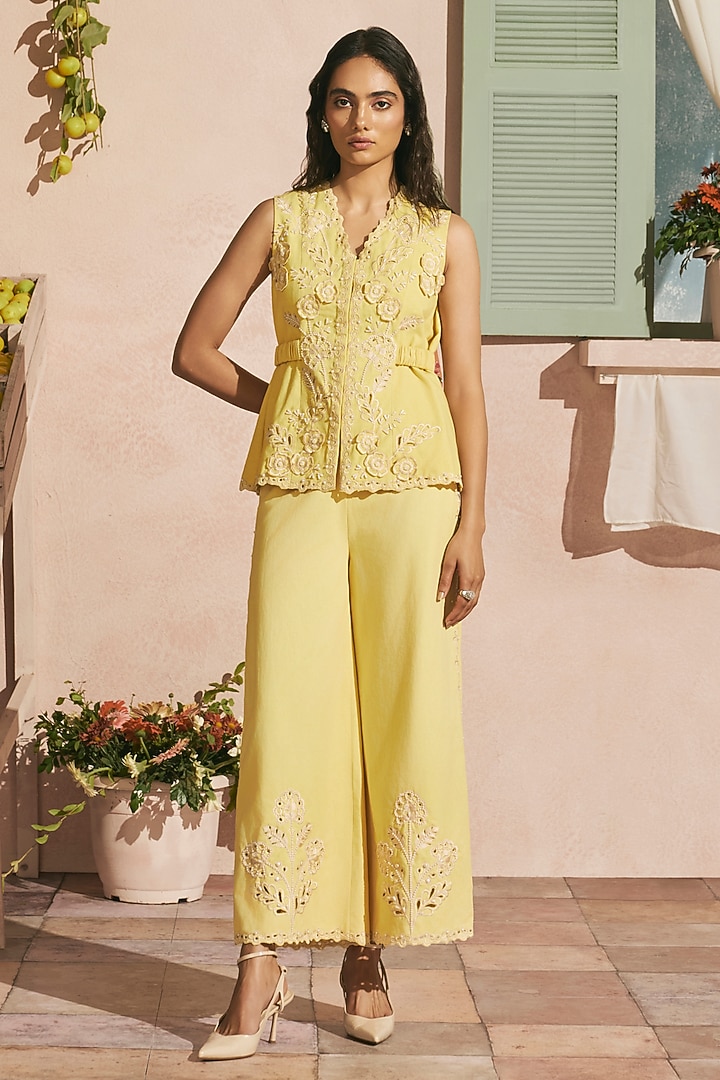 Butter Yellow Cotton Twill Cutwork Flared Pants by Chandrima at Pernia's Pop Up Shop