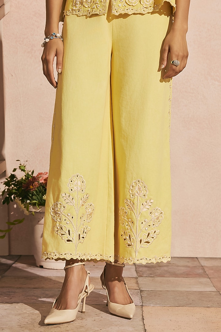 Butter Yellow Cotton Twill Cutwork Flared Pants by Chandrima at Pernia's Pop Up Shop