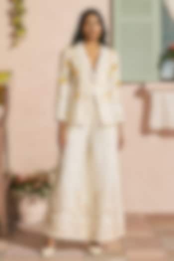Ivory Chanderi Cutwork Flared Pants by Chandrima at Pernia's Pop Up Shop