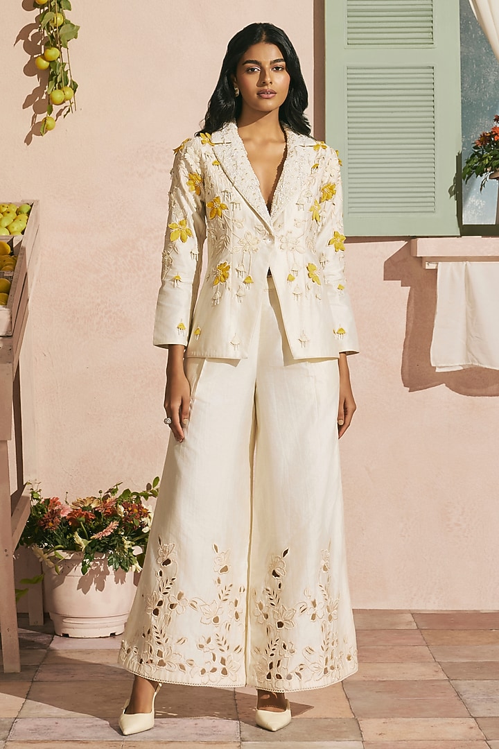 Ivory Chanderi Cutwork Flared Pants by Chandrima at Pernia's Pop Up Shop