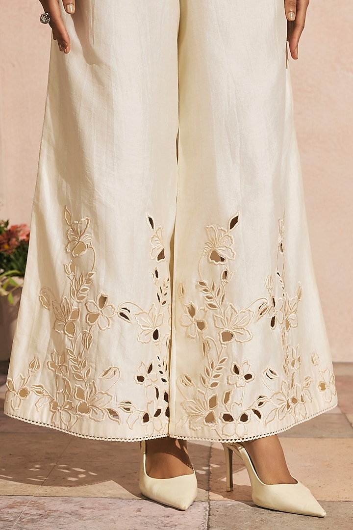 Ivory Chanderi Cutwork Flared Pants by Chandrima at Pernia's Pop Up Shop
