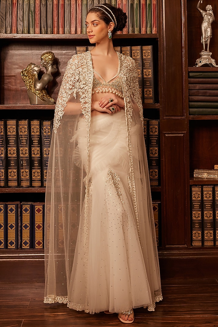 Ivory Tulle Crystal Embellished Jacket Bridal Lehenga Set by Cherie D at Pernia's Pop Up Shop