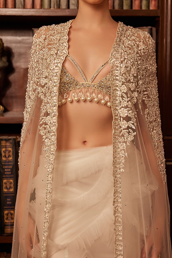 Ivory Tulle Crystal Embellished Jacket Bridal Lehenga Set by Cherie D at Pernia's Pop Up Shop