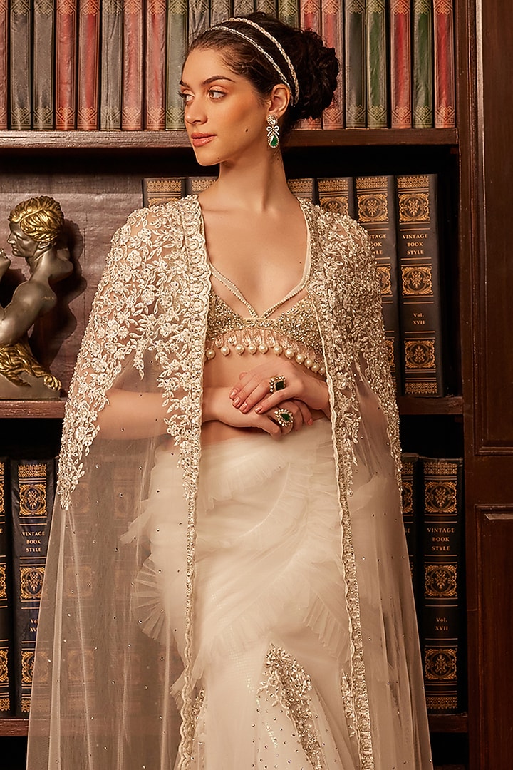 Ivory Tulle Crystal Embellished Jacket Bridal Lehenga Set by Cherie D at Pernia's Pop Up Shop