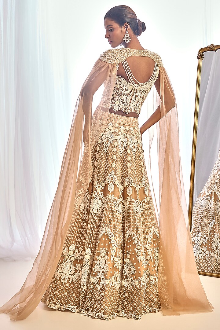 Nude Tulle Crystal Embroidered Jacket Bridal Lehenga Set by Cherie D at Pernia's Pop Up Shop