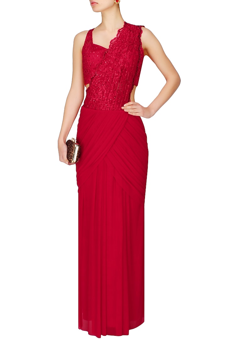 Red stones and sequins embroidered pre draped saree available only at Pernia's Pop Up Shop.