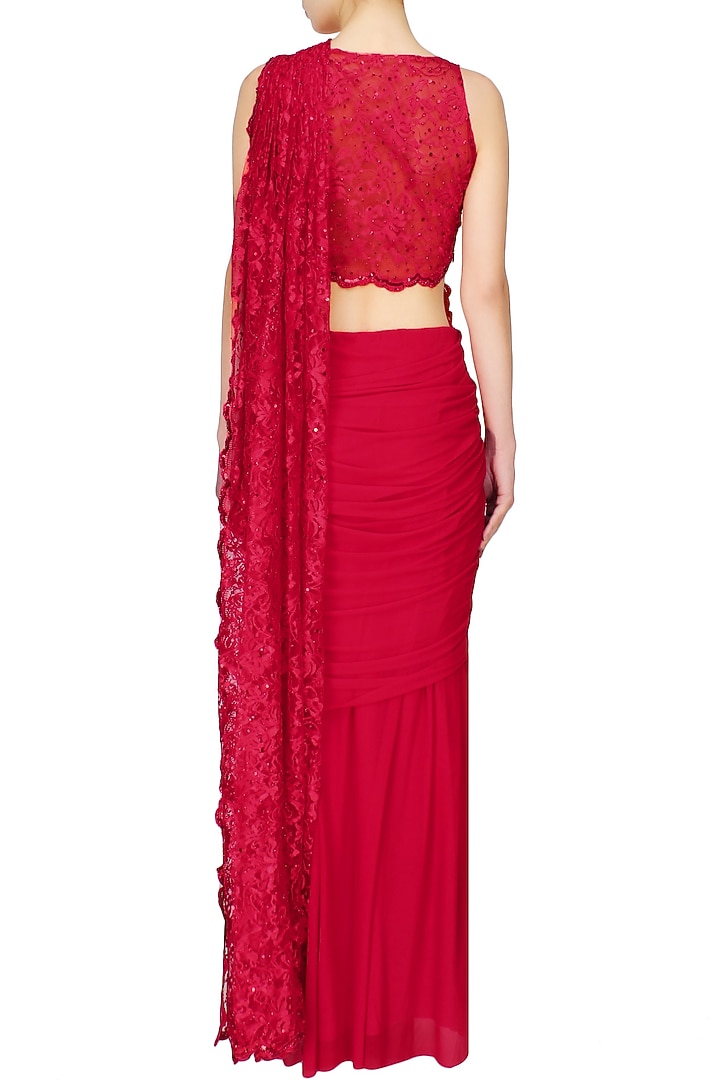 Red stones and sequins embroidered pre draped saree available only at Pernia's Pop Up Shop.