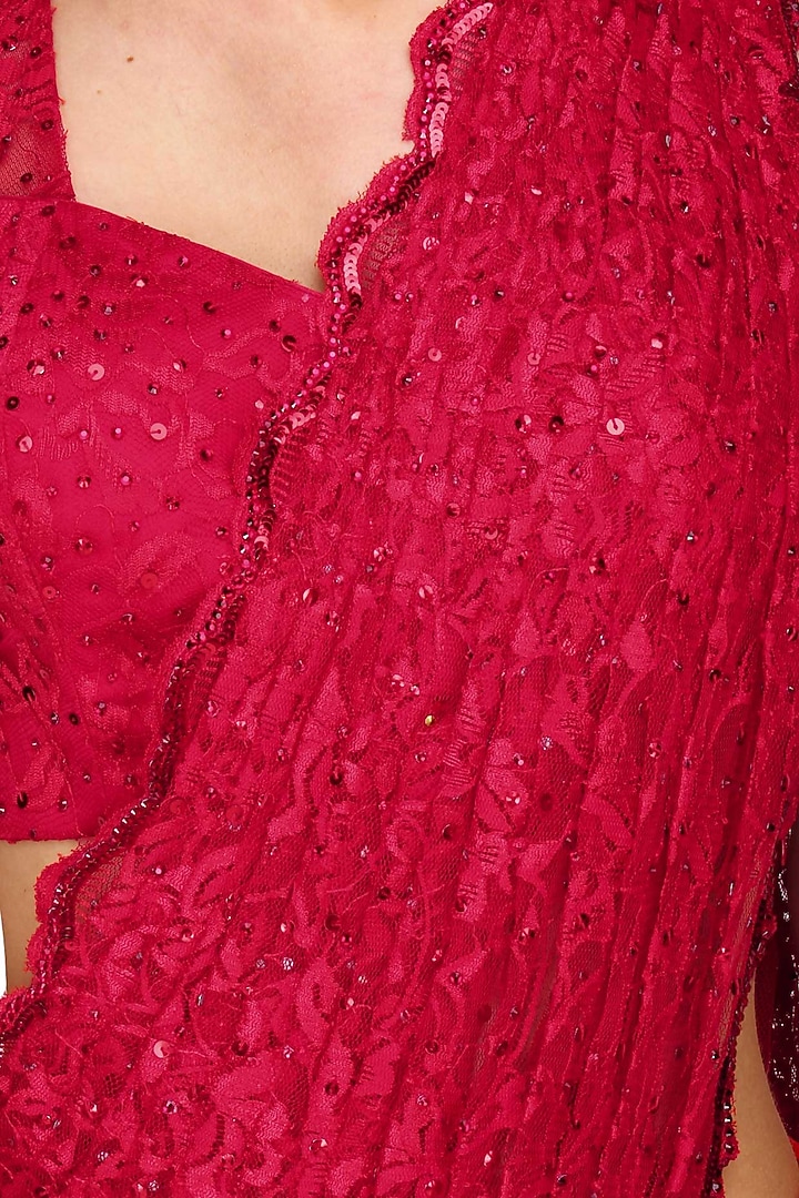 Red stones and sequins embroidered pre draped saree available only at Pernia's Pop Up Shop.