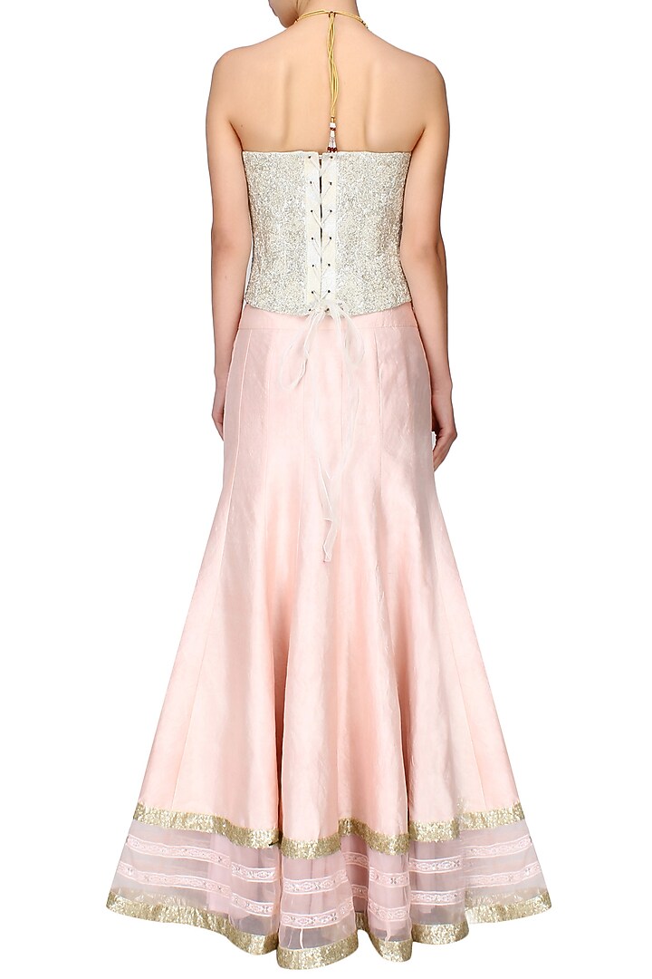 Powder pink sequins embroidered lehenga and ivory beaded corset set available only at Pernia's Pop Up Shop.