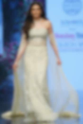 Ivory Net Hand Embroidered Bridal Lehenga Set by Chhavvi Aggarwal at Pernia's Pop Up Shop