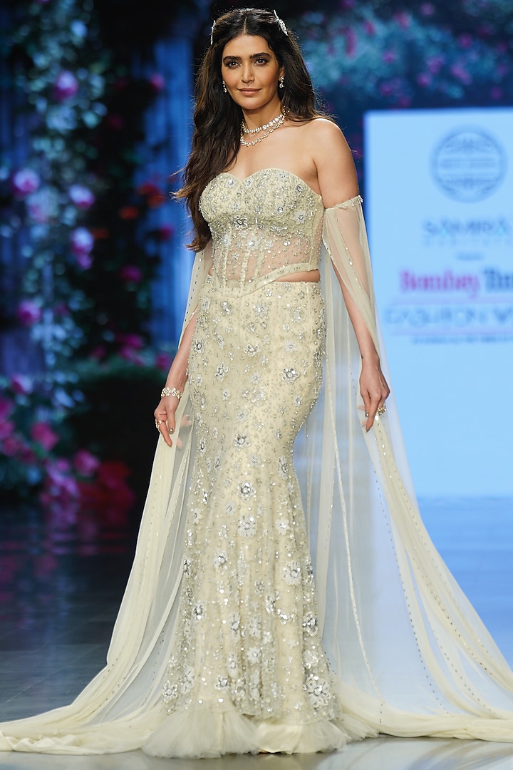 Ivory Net Hand Embroidered Bridal Lehenga Set by Chhavvi Aggarwal at Pernia's Pop Up Shop