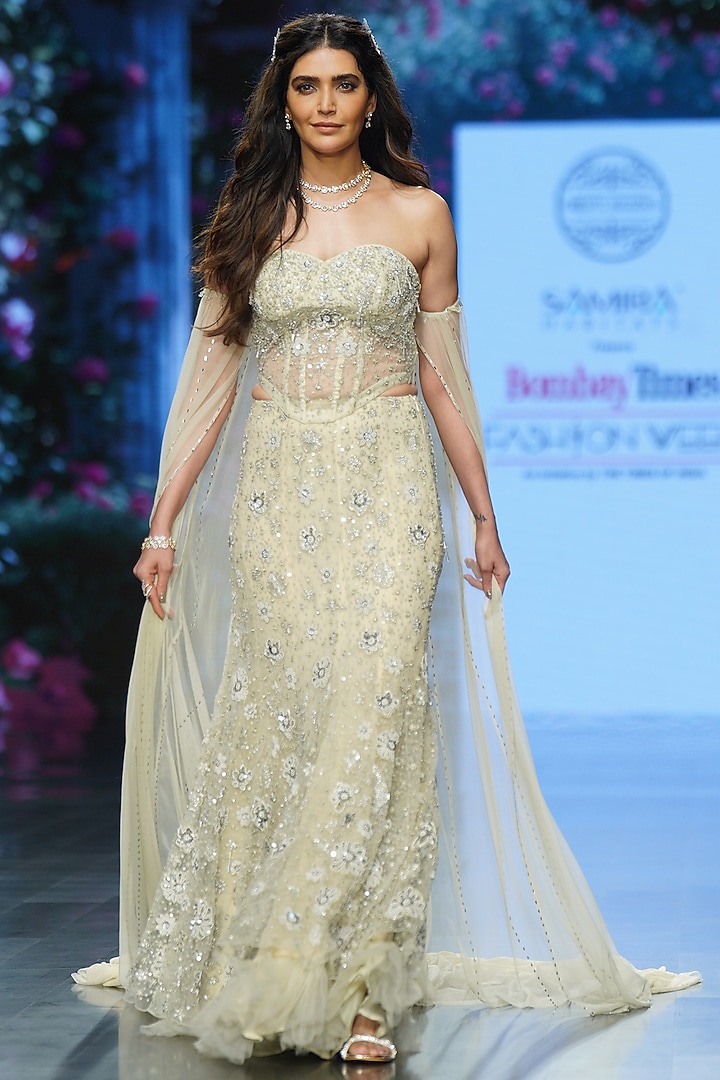 Ivory Net Hand Embroidered Bridal Lehenga Set by Chhavvi Aggarwal at Pernia's Pop Up Shop