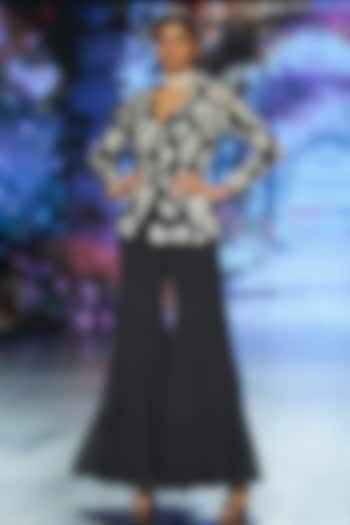 Black Crepe & Georgette Tiered Wedding Sharara Set by Chhavvi Aggarwal at Pernia's Pop Up Shop