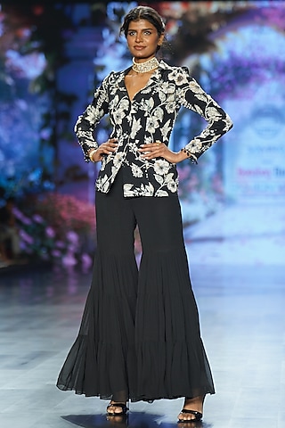 Black Crepe & Georgette Tiered Sharara Set by Chhavvi Aggarwal