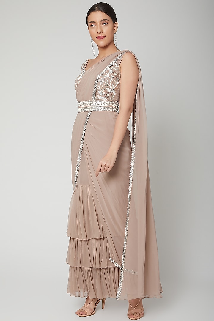 Nude Georgette Pre-Stitched Frilled Saree Set by Chhavvi Aggarwal