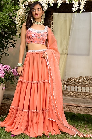 Coral Embroidered Tiered Lehenga Set by Chhavvi Aggarwal