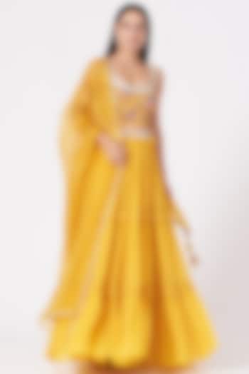 Yellow Georgette Tiered Lehenga Set by Chhavvi Aggarwal