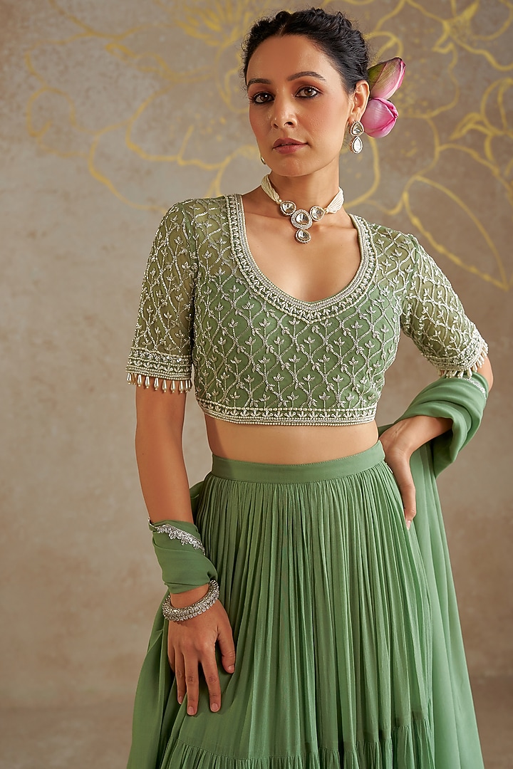 Sage Green Georgette Tiered Wedding Lehenga Set by Chhavvi Aggarwal at Pernia's Pop Up Shop