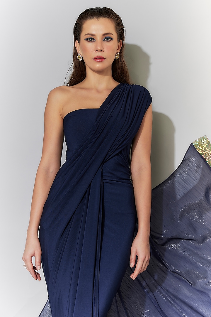 Blue Stretch Knit & Chiffon Flared One-Shoulder Party Wear Gown by CHAM CHAM at Pernia's Pop Up Shop