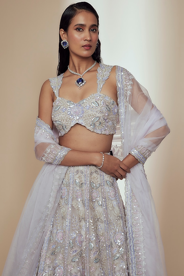 Ivory Organza Crystal Beads Embroidered Bridal Lehenga Set by Label Charmie Galaiya at Pernia's Pop Up Shop