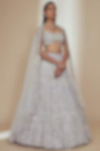 Ivory Organza Crystal Beads Embroidered Bridal Lehenga Set by Label Charmie Galaiya at Pernia's Pop Up Shop