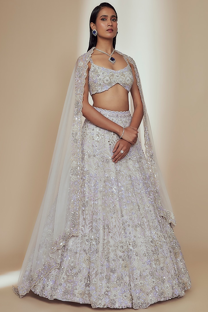 Ivory Organza Crystal Beads Embroidered Bridal Lehenga Set by Label Charmie Galaiya at Pernia's Pop Up Shop