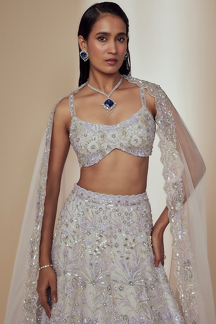 Ivory Organza Crystal Beads Embroidered Bridal Lehenga Set by Label Charmie Galaiya at Pernia's Pop Up Shop