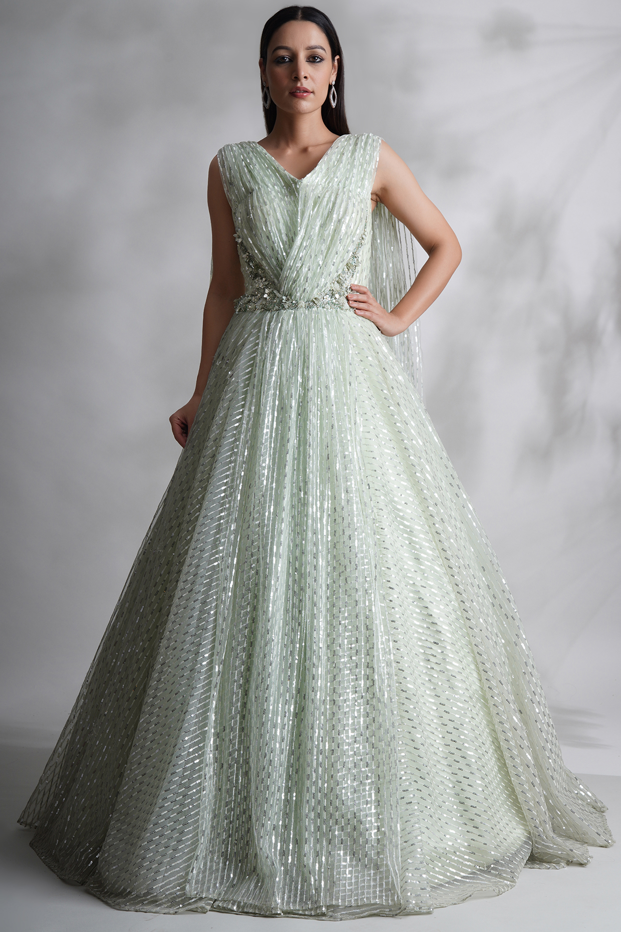 Green Net Sequins Embroidered Engagement Gown by Chaashni by Maansi and Ketan at Pernia's Pop Up Shop
