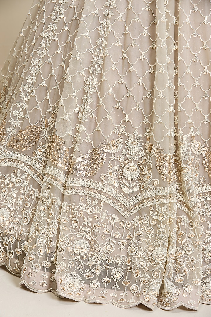 Nude Net Embellished Wedding Lehenga Set by Chaashni by Maansi and Ketan at Pernia's Pop Up Shop