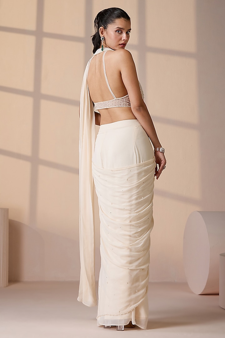 Ivory Georgette & Net Pearl Embellished Stitched Wedding Saree Set by Chaashni by Maansi and Ketan at Pernia's Pop Up Shop