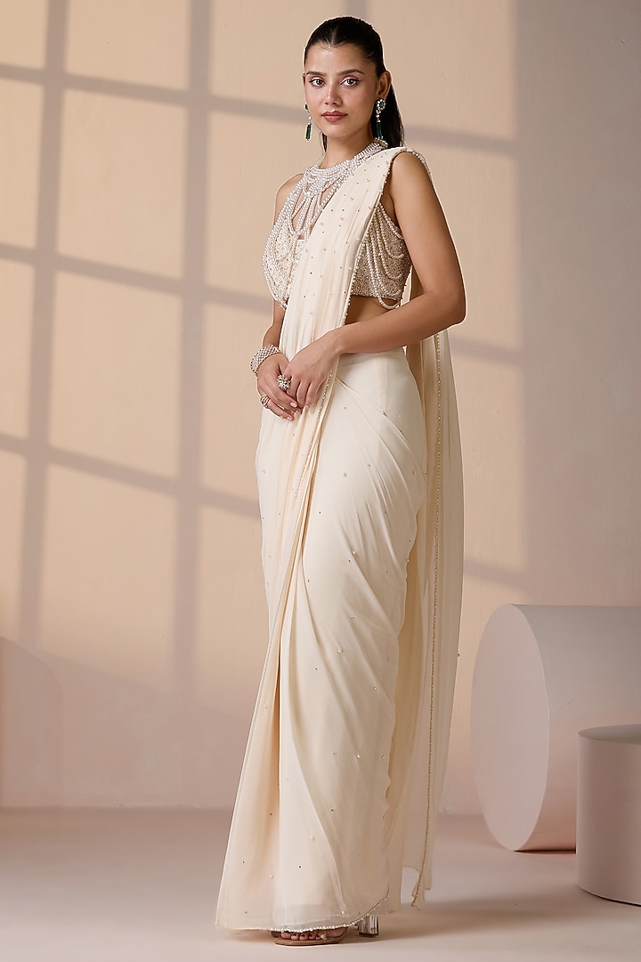 Ivory Georgette & Net Pearl Embellished Stitched Wedding Saree Set by Chaashni by Maansi and Ketan at Pernia's Pop Up Shop