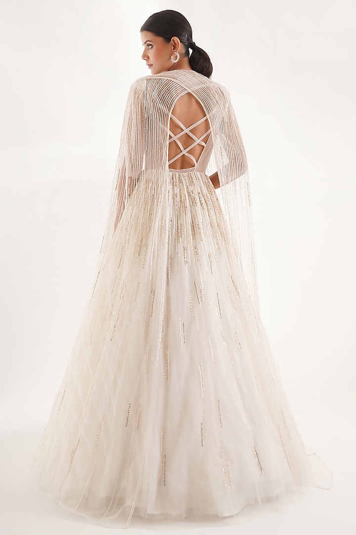 White Glitter Net Sequins & Cutdana Embellished Engagement Gown With Cape by Chaashni by Maansi and Ketan at Pernia's Pop Up Shop