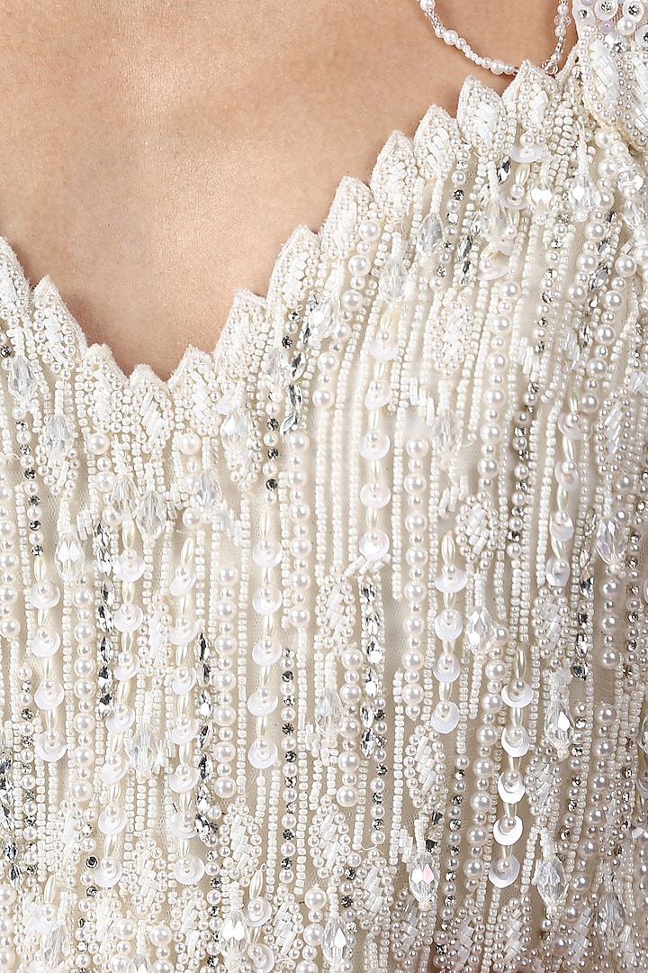 Off-White Net Pearl Embellished Wedding Gown With Cape by Chaashni by Maansi and Ketan at Pernia's Pop Up Shop