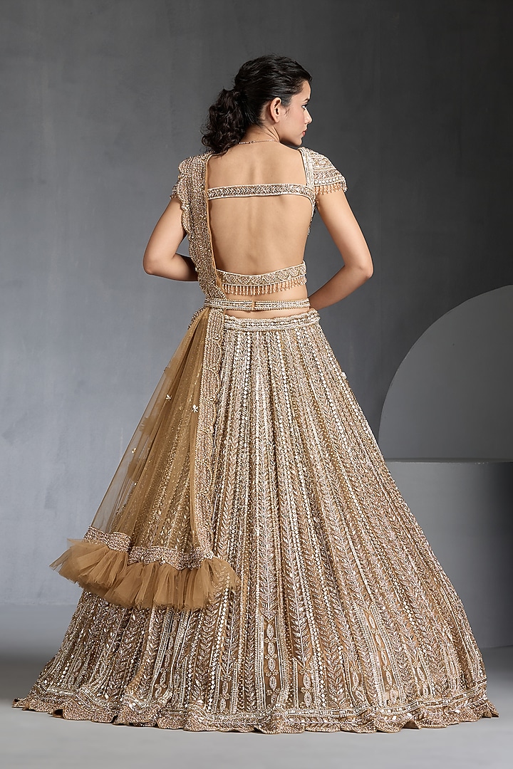 Gold Net Sequins & Pearl Embellished Bridal Lehenga Set by Chaashni by Maansi and Ketan at Pernia's Pop Up Shop
